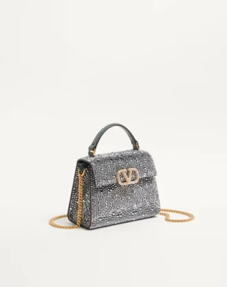 Mini bolsa Valentino Garavani Vsling com strass e logótipo em joias